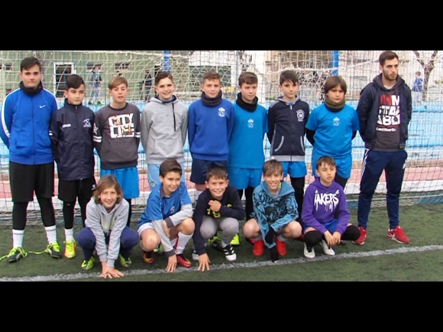 Pablo Marra y su alevín del UP Viso